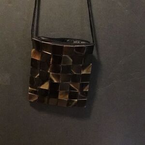 Vintage Abalone shell purse by Shiraleah has snags on back front is perfect